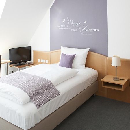 Hotel Am Markt Hungen Bagian luar foto